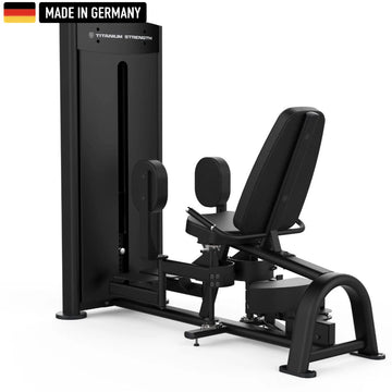 A leg exercise machine with padded seat and adjustable foot platform. Black design with "Made in Germany" label at the top left.