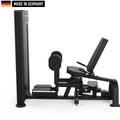 A leg exercise machine with padded seat and adjustable foot platform. Black design with 