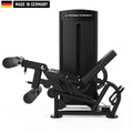 A sleek, black Titanium Strength gym machine with padded leg supports and adjustable features, labeled 