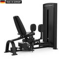 A leg exercise machine with padded seat and adjustable foot platform. Black design with 