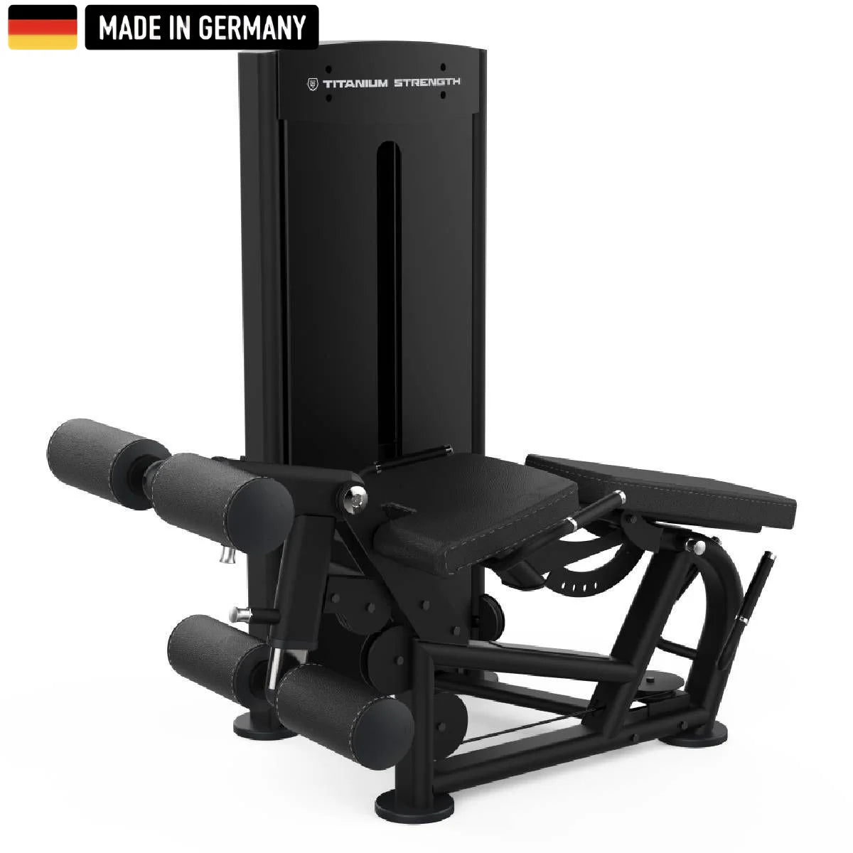 A sleek, black Titanium Strength gym machine with padded leg supports and adjustable features, labeled "Made in Germany."