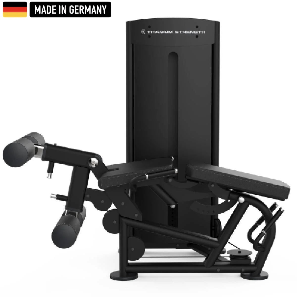 A sleek, black Titanium Strength gym machine with padded leg supports and adjustable features, labeled "Made in Germany."