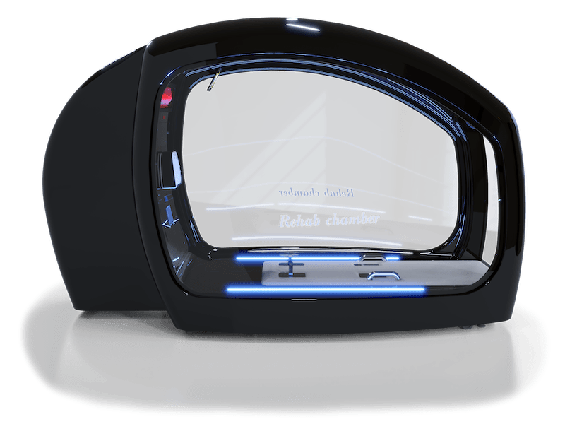 A sleek black rehabilitation chamber with a futuristic design, featuring a large curved glass front with "Rehab chamber" written on it. The interior is illuminated with blue LED lights, showcasing a modern and advanced setup ideal for therapeutic purposes.