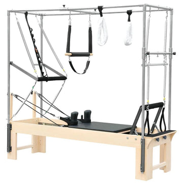 A pilates reformer featuring a bar and straps, designed for versatile strength and flexibility training.