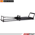 Elina Pilates Domo Reformer – compact, foldable Pilates reformer made of aluminum with adjustable footboard and transport wheels.
