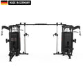 Large multi-station gym machine in black, featuring multiple cable pulleys, adjustable weight stacks, pull-up bars, seated row stations, and Smith machine bars. The equipment is branded 