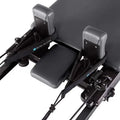 Elina Pilates Domo Reformer – compact, foldable Pilates reformer made of aluminum with adjustable footboard and transport wheels.
