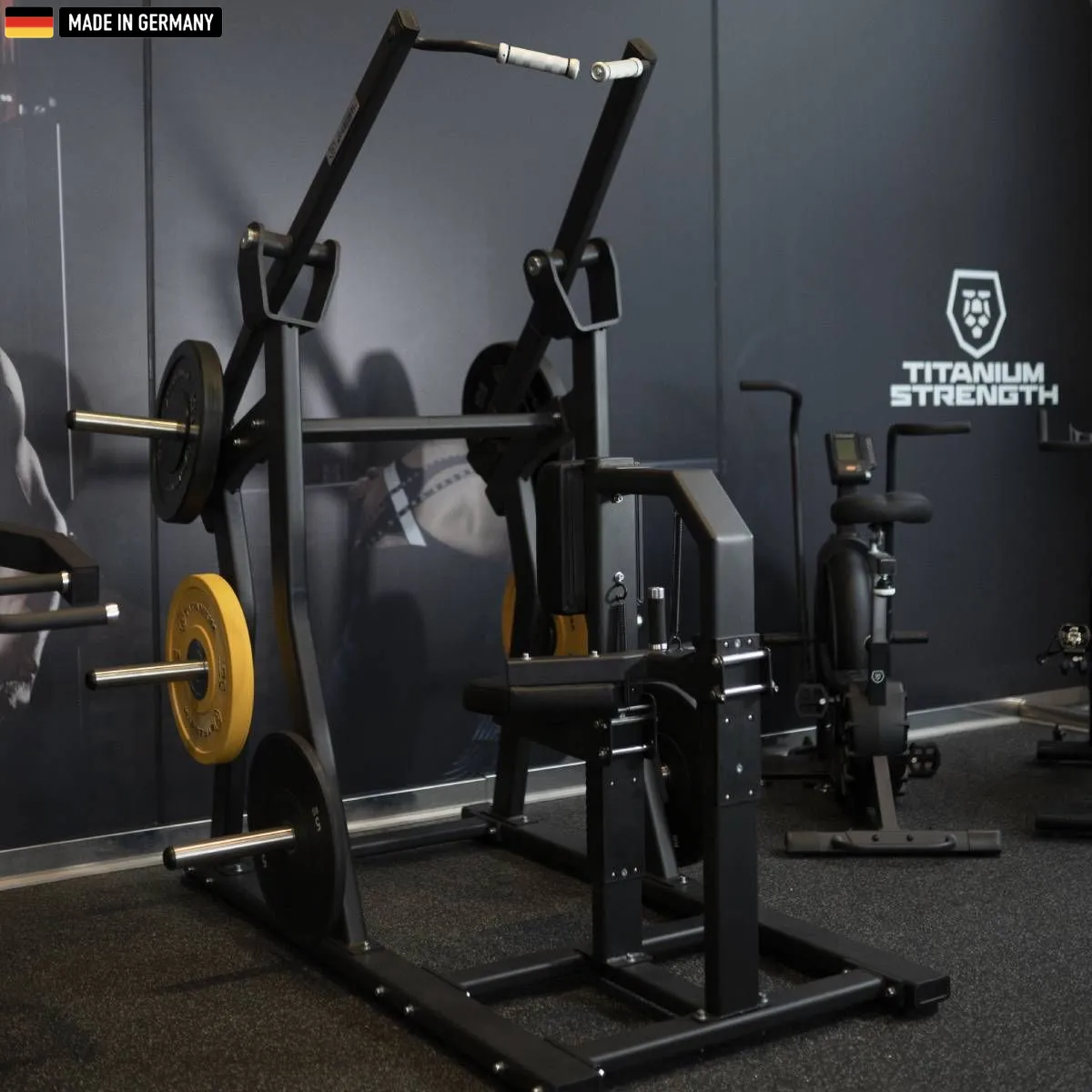 Elite Series Isolateral Lat Pulldown machine by Titanium Strength in a modern gym environment