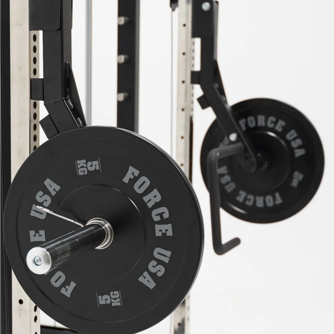 Force USA G9 and G12 Jammer Arms attached to the All-In-One Trainer, demonstrating bench press exercise.