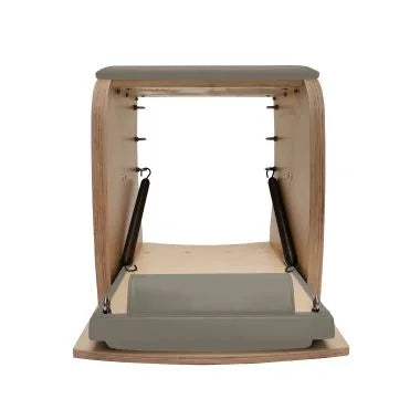 Elina Pilates Wunda Chair made of solid maple wood with adjustable resistance and ergonomic design for effective Pilates training.
